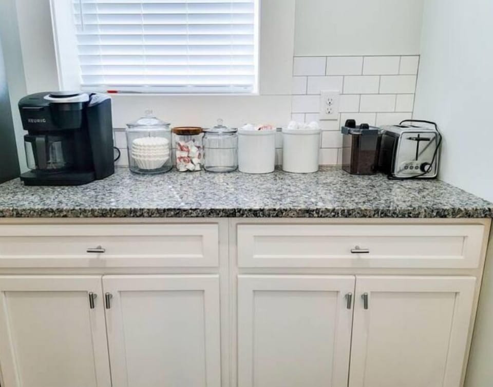 Keurig Duo- K cups or drip. Coffee, cream, sugar, tea, and hot chocolate here!