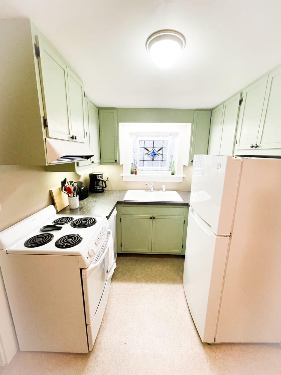 Kitchen is "cozy" in size, but has everything you need !