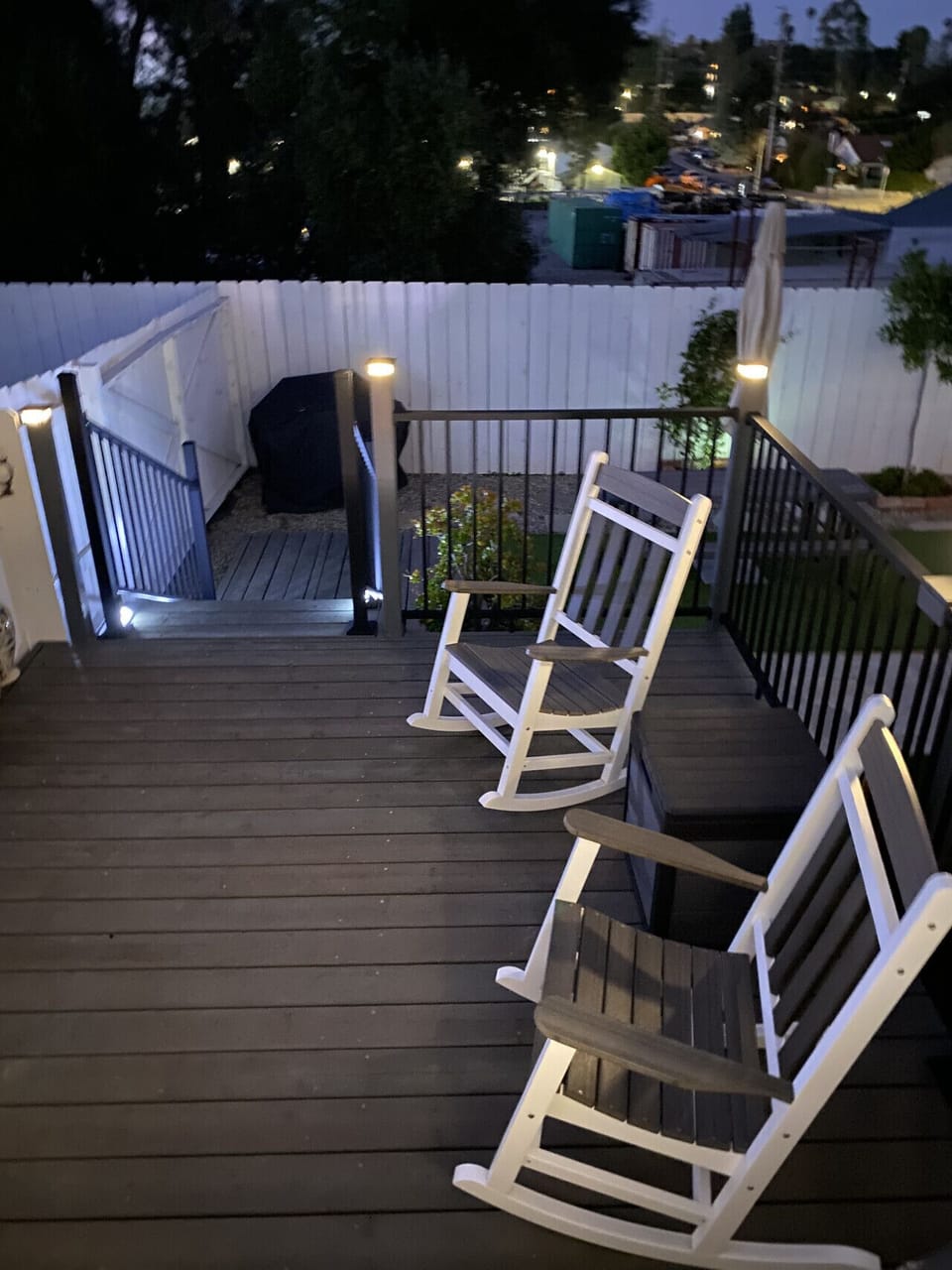 Outside deck at night, with two rocking chairs to enjoy the stars
