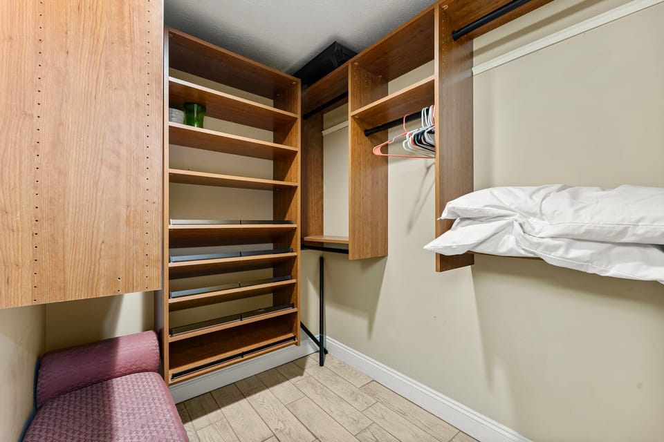 Handy built-in closet shelving — plenty of storage to keep you organized all stay.