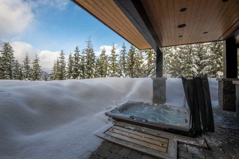 Hot tub accessed by the ground floor through the mud room