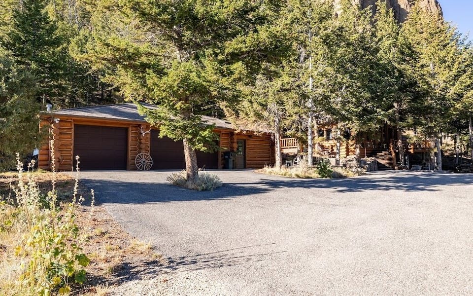 Tucked in the trees! Detached bedroom in garage apartment. Garage is not accessible to guests