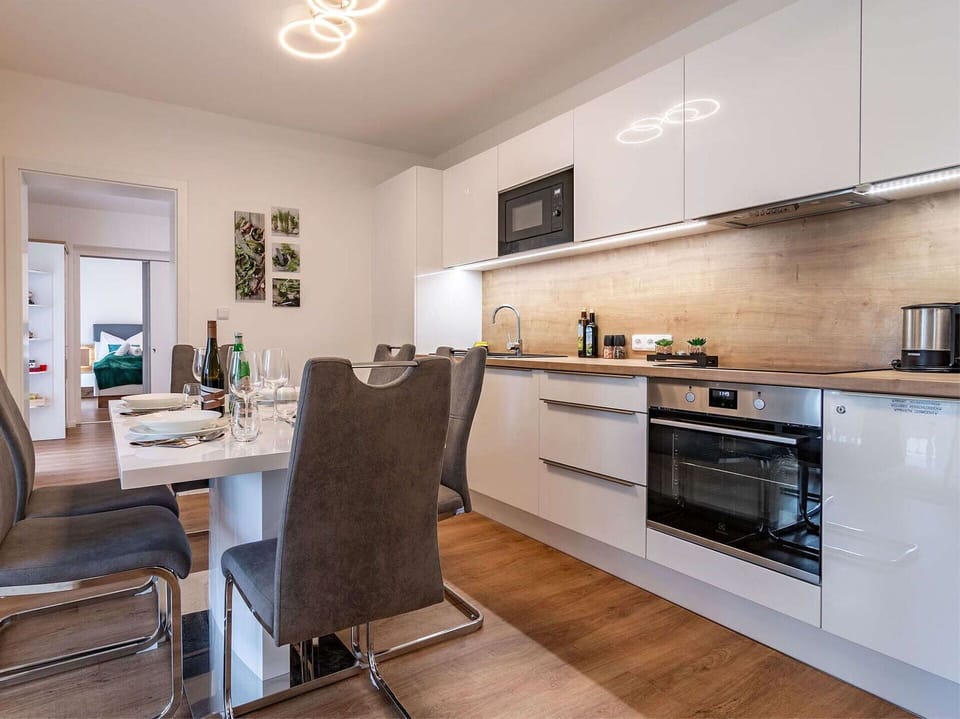 Furniture, Cabinetry, Picture Frame, Wood, Kitchen Stove, Flooring, Floor, Building, Countertop, Home Appliance