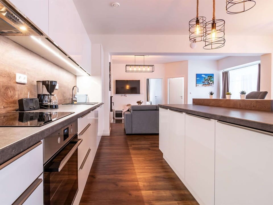 Cabinetry, Furniture, Countertop, Property, Wood, Interior Design, Kitchen, Lighting, Architecture, House