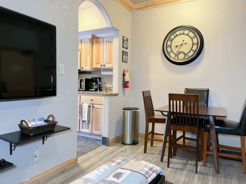 The natural tones and high-quality fixtures provide a serene and stylish atmosphere. (Kitchenette and dining table)