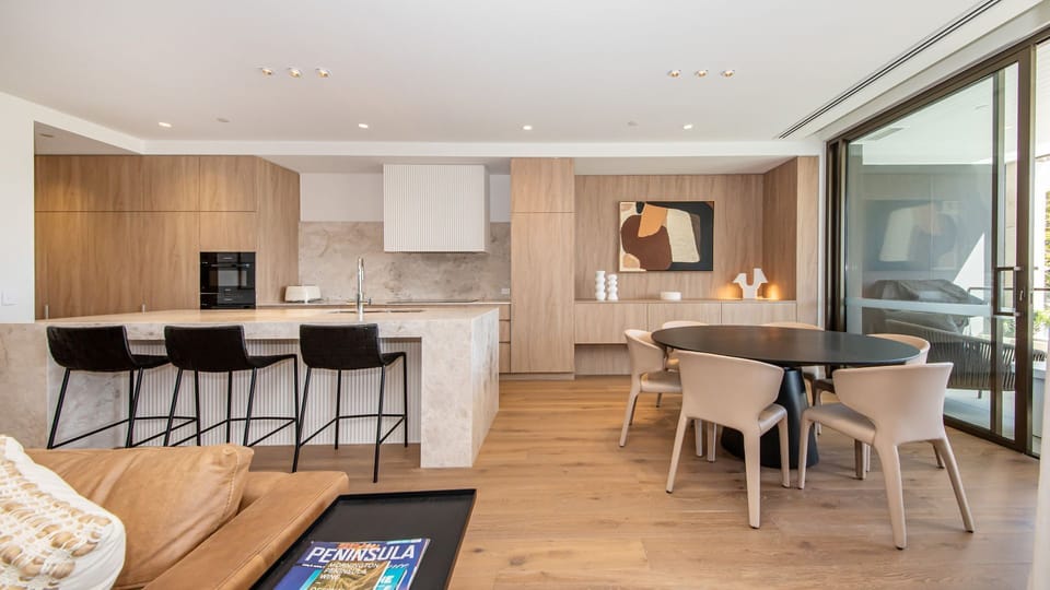Kitchen/Dining opening out to balcony with sea views