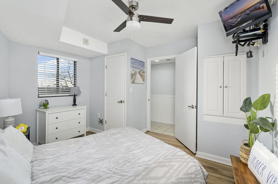 Sink into bed & enjoy the Flat Screen TV!