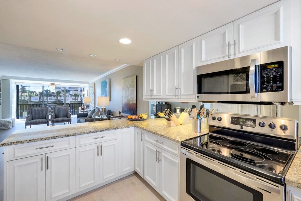 Fully equipped Kitchen with China, Pots & Pans, Pot Holders, Utensils. 