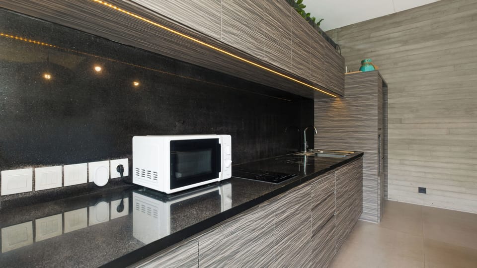 Exclusive Room, 2 Bedrooms | Private kitchen | Coffee/tea maker, fridge, microwave, cookware/dishes/utensils