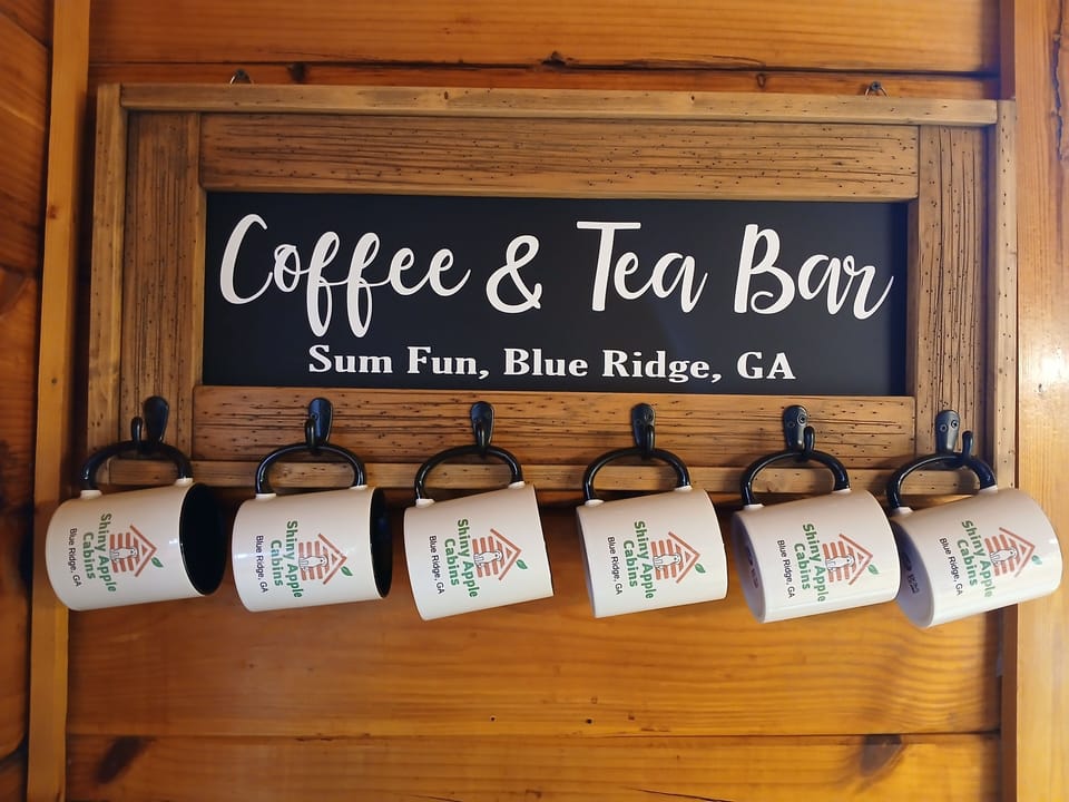 Shiny Apple Cabins mugs for your coffee, tea, hot chocolate enjoyment.