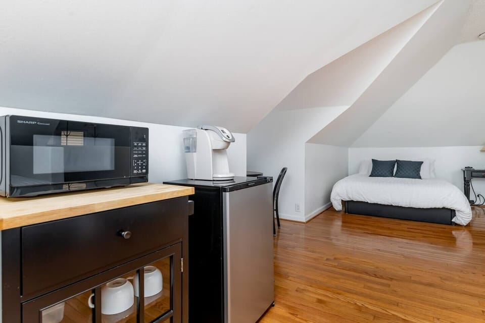 Mini kitchenette area upper level. Coffee, mini fridge and microwave