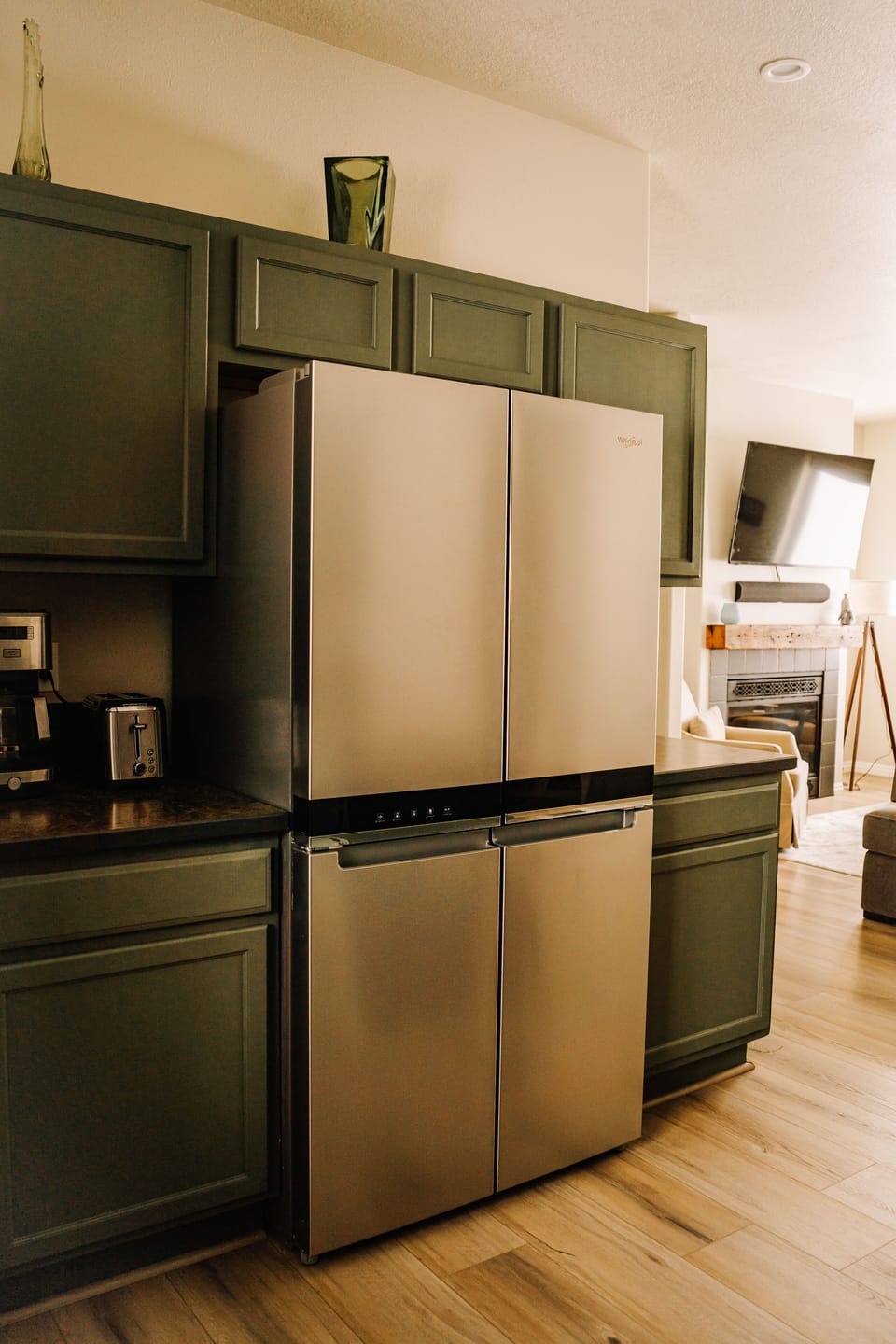 Open kitchen to living with plenty of fridge and counter space