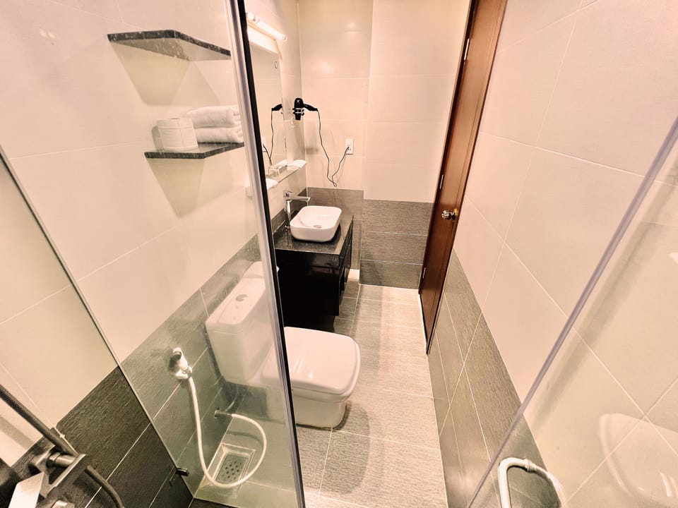Shower, hair dryer, slippers, bidet