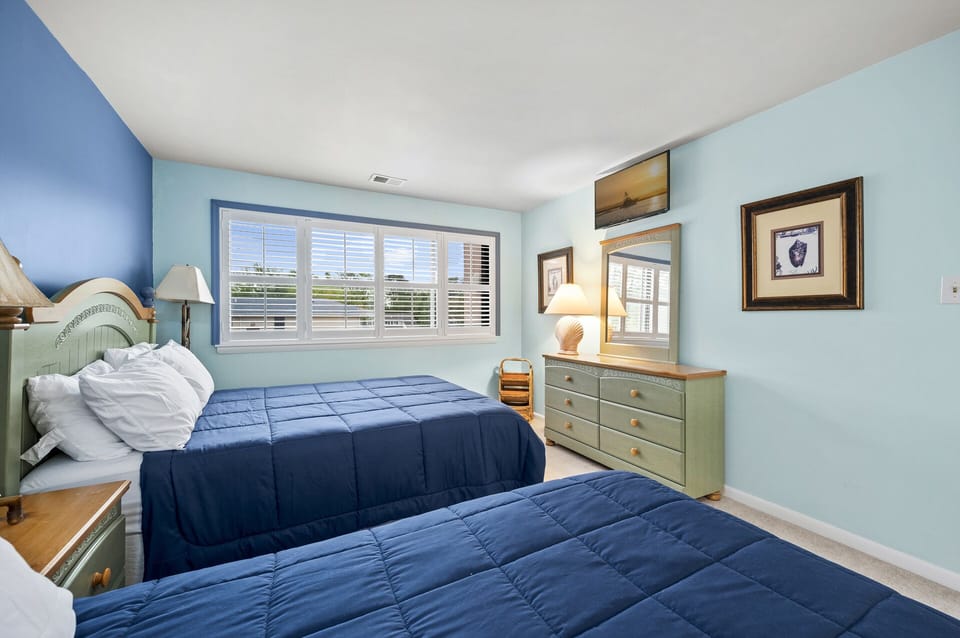 Flat Screen TV in Bedroom 2.