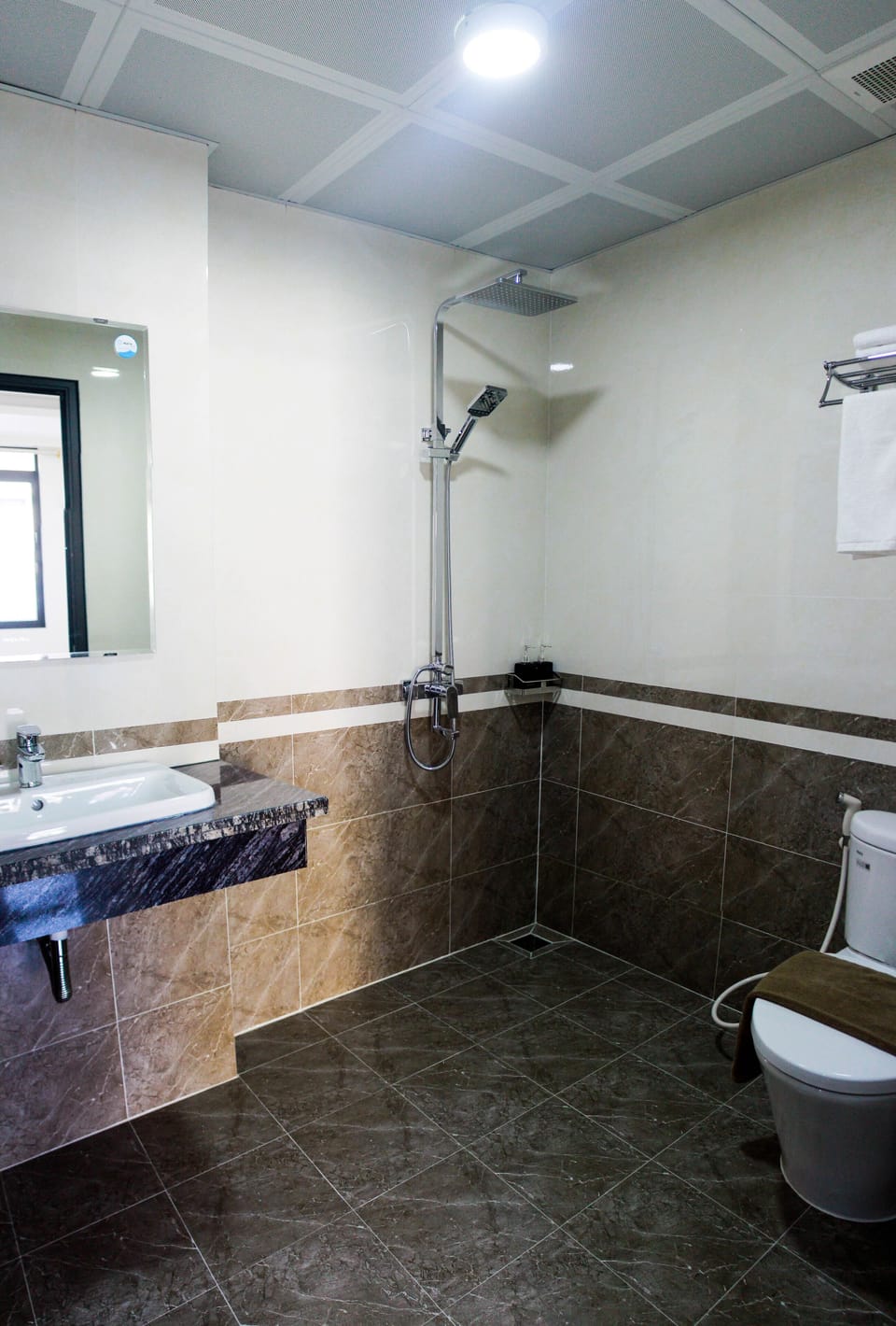 Rainfall showerhead, hair dryer, slippers, towels