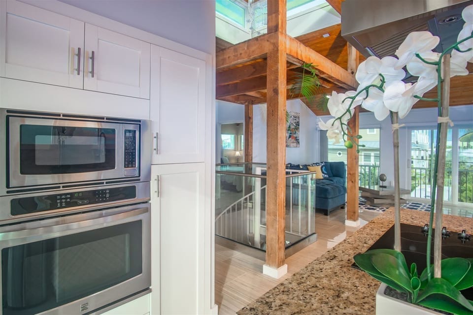 Stainless steel appliances in the kitchen.