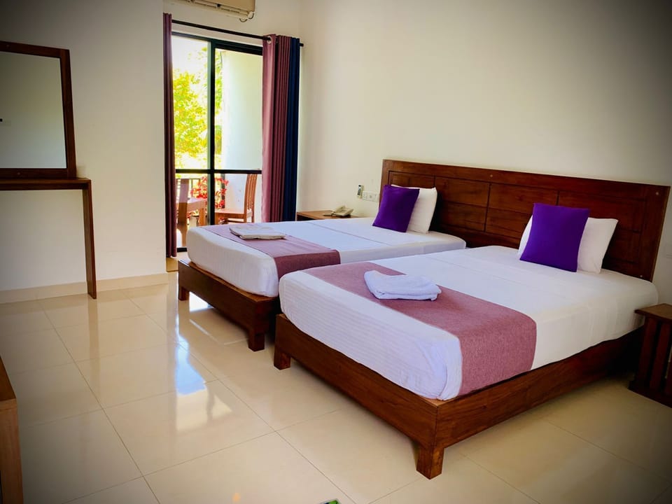Grand Room | Memory foam beds, in-room safe, desk, laptop workspace
