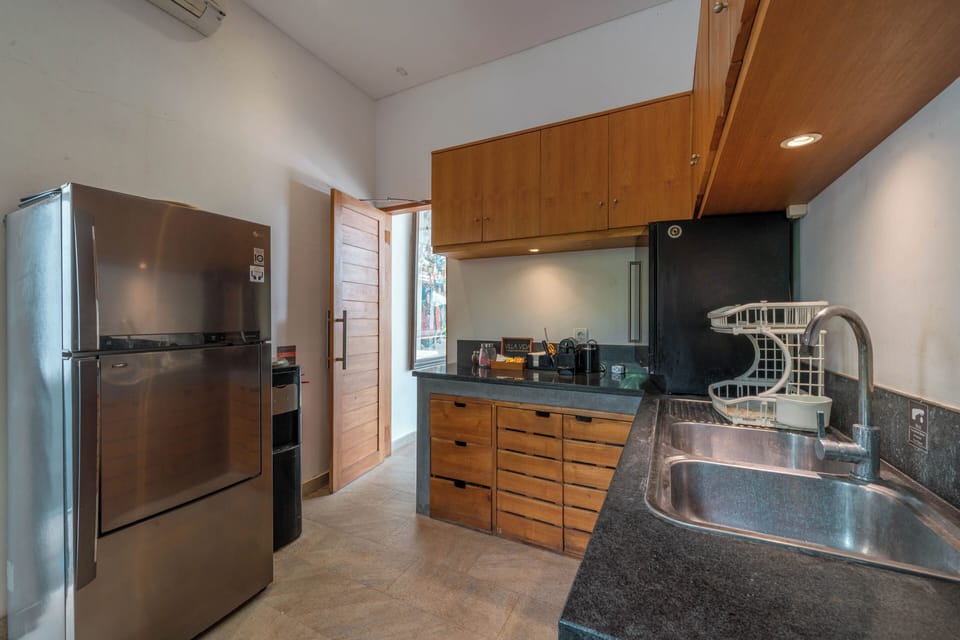 Luxury Villa | Private kitchen | Full-size fridge, oven, stovetop, espresso maker
