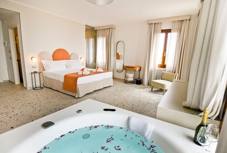 Luxury Room, Jetted Tub (Verbena) | Down comforters, minibar, in-room safe, blackout drapes