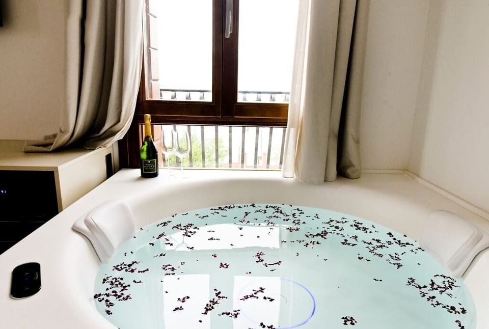 Luxury Room, Jetted Tub (Verbena) | Down comforters, minibar, in-room safe, blackout drapes