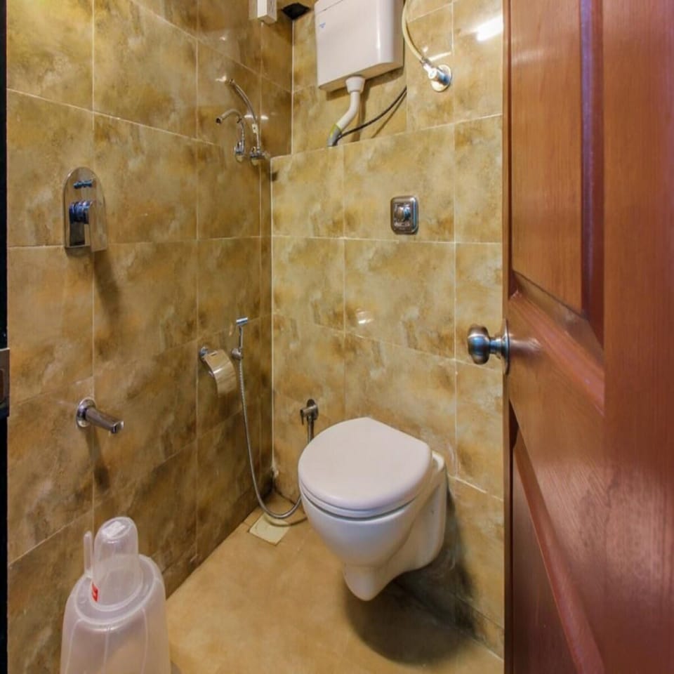 Shower, rainfall showerhead, towels, soap