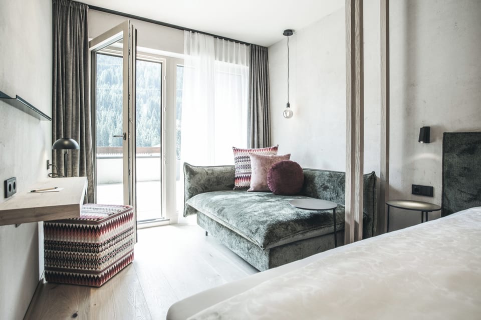 Deluxe Suite, Terrace | Hypo-allergenic bedding, minibar, in-room safe, soundproofing