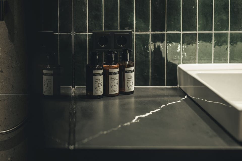 Deluxe Suite, Terrace | Bathroom | Free toiletries, bathrobes, slippers, towels