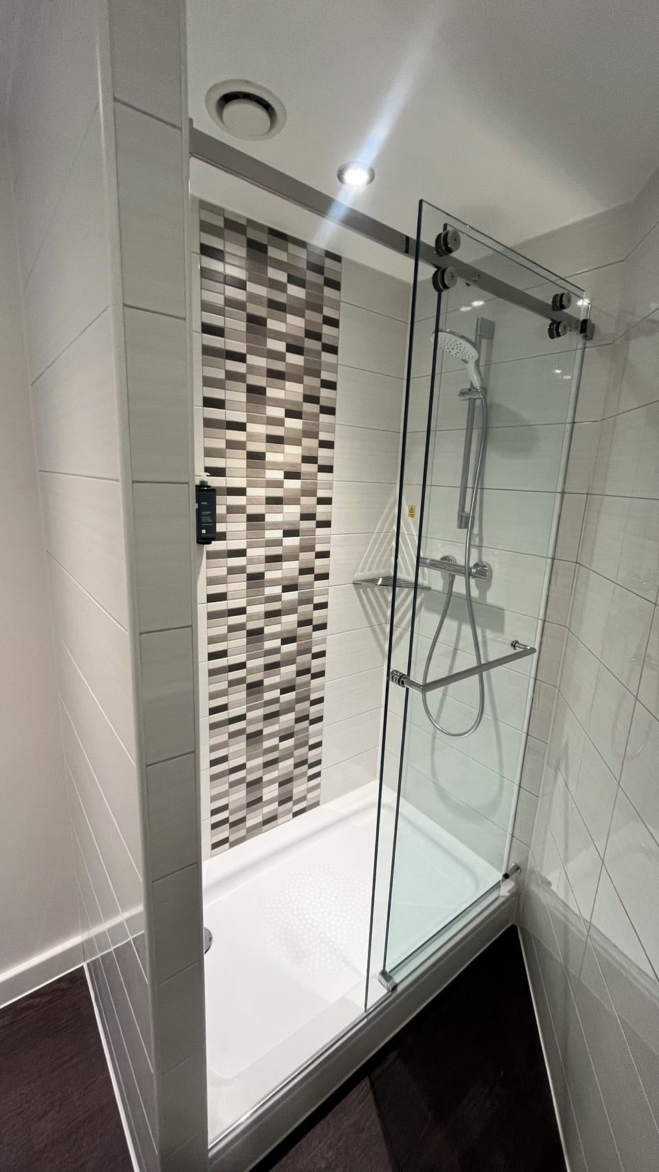 Shower, eco-friendly toiletries, hair dryer, towels