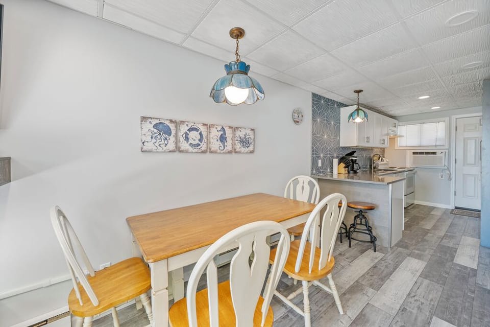 Colors of sand & sea with floors reminiscent of a stroll on the boardwalk!