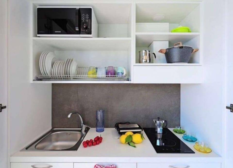 Electric kettle, coffee grinder, cookware/dishes/utensils