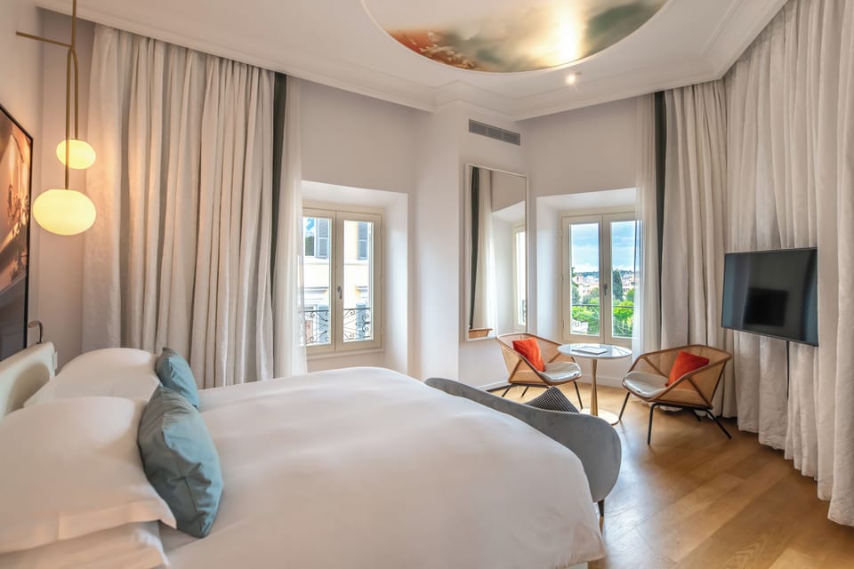 Family Room, Multiple Beds, Connecting Rooms | Premium bedding, minibar, in-room safe, blackout drapes