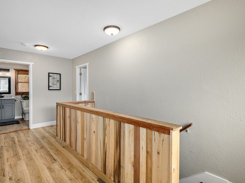 Stair way to 2 upstairs bedrooms and 1 bathroom
