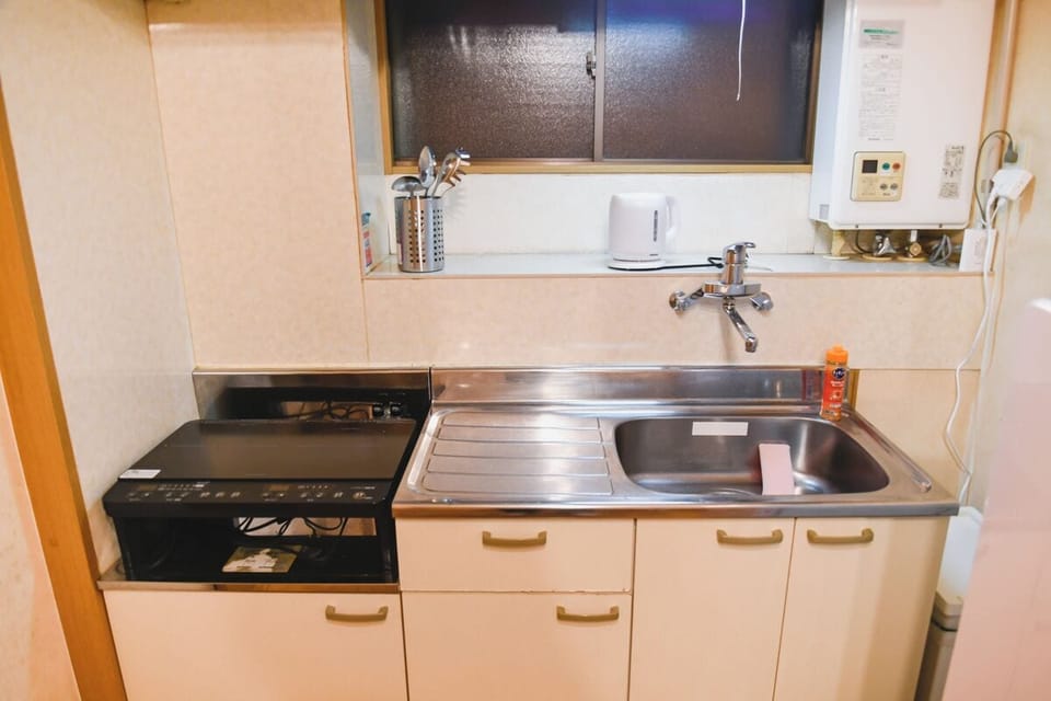 House | Private kitchen | Full-size fridge, microwave, stovetop, electric kettle