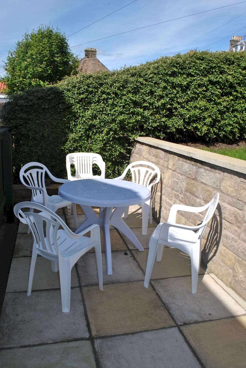 Tiered garden with seating for outdoor dining

