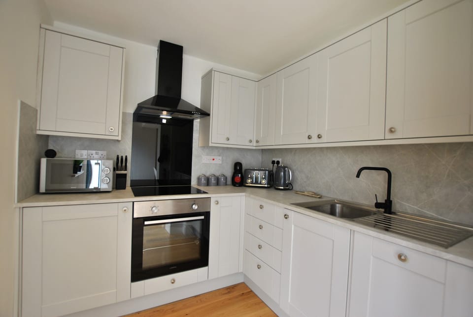 The well-equipped kitchen has everything expected for a self-catering stay