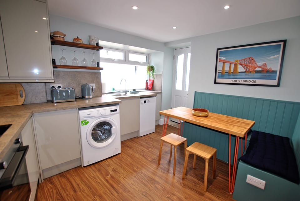 Well equipped kitchen with a sociable layout for dining