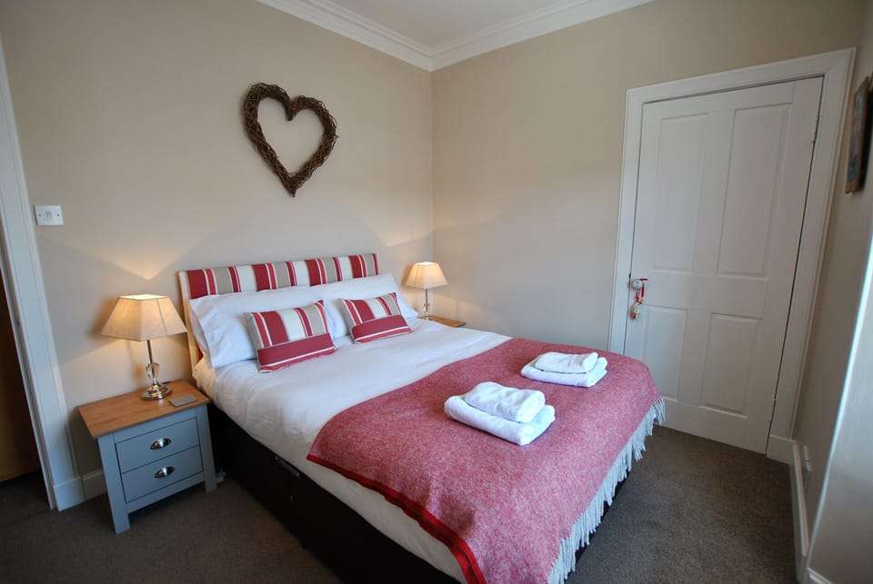 The double room is to the front of the property