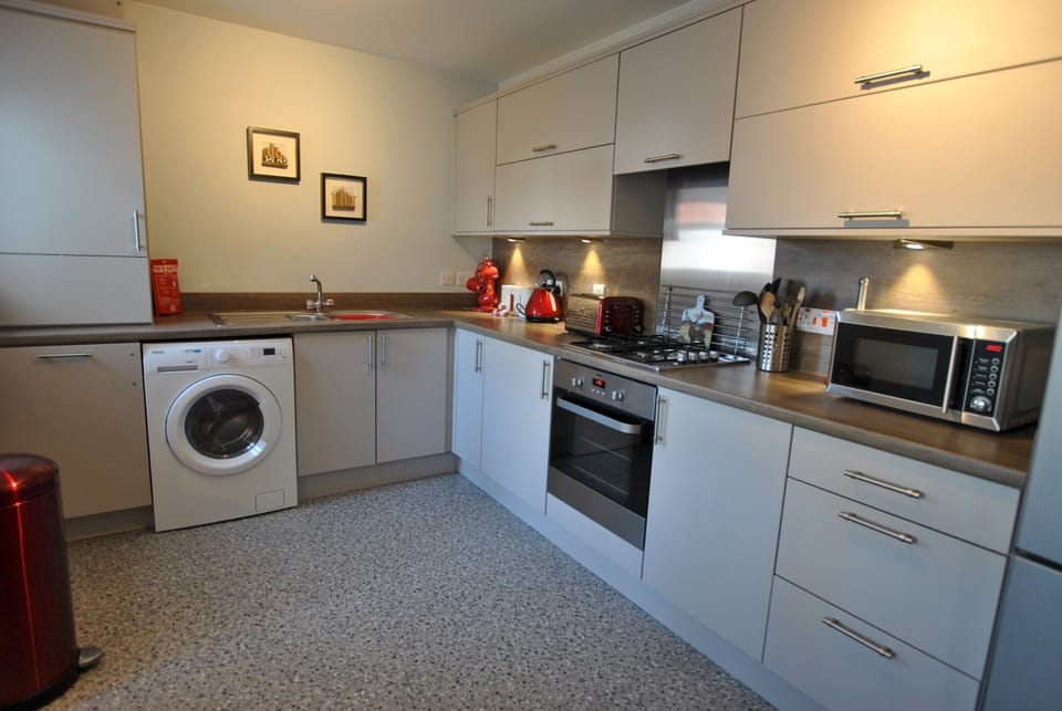 Fully fitted kitchen with modern appliances