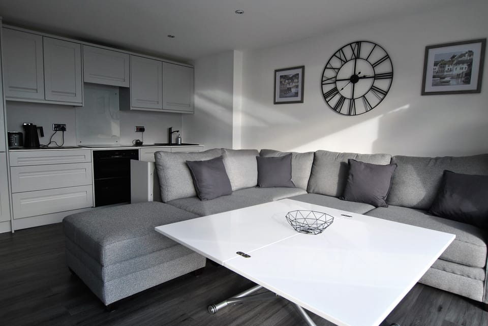 The coffee table can be adapted for use as a dining area