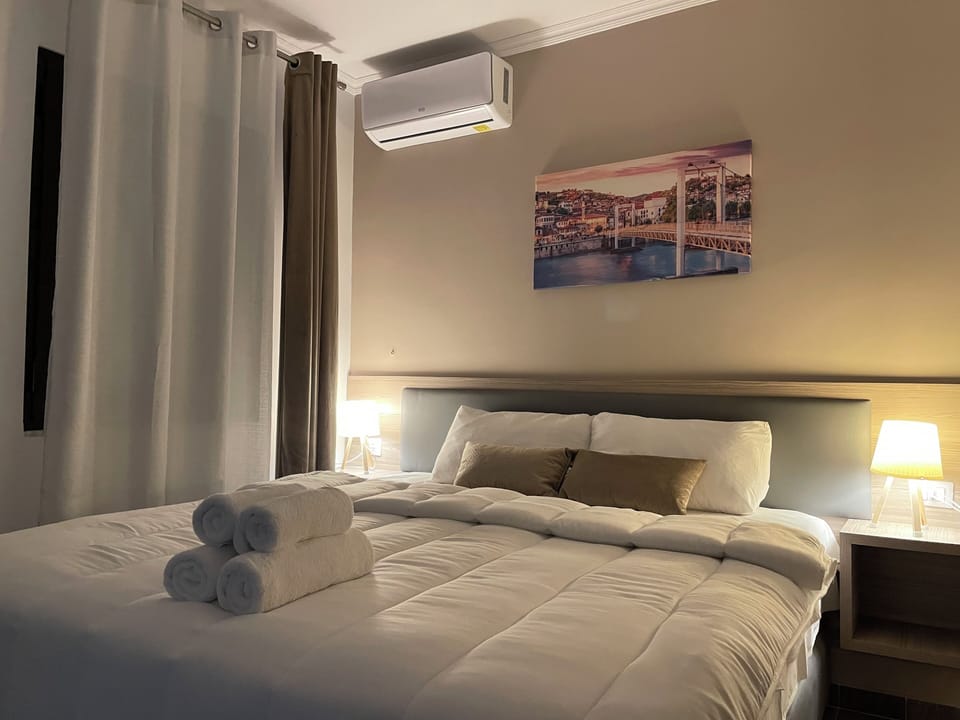 Premium bedding, down comforters, desk, blackout drapes