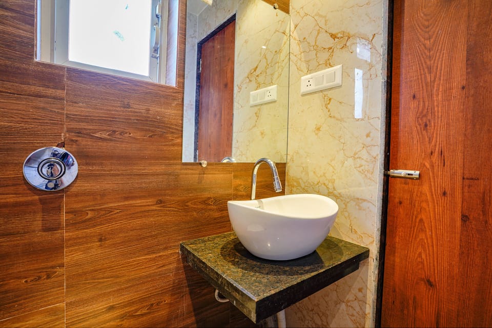 Shower, rainfall showerhead, towels