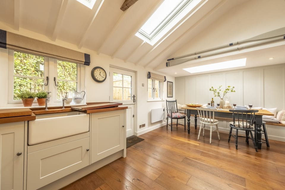 Ground floor: The kitchen stable door leads directly to the rear garden and summerhouse