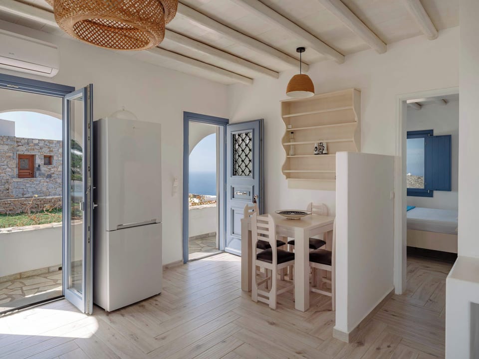 Bright, open-plan living space with easy access to the terrace and sea views.