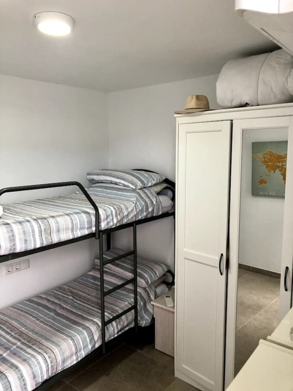 Bunk bedded room at side of villa with a door leading on to the jacuzzi terrace

