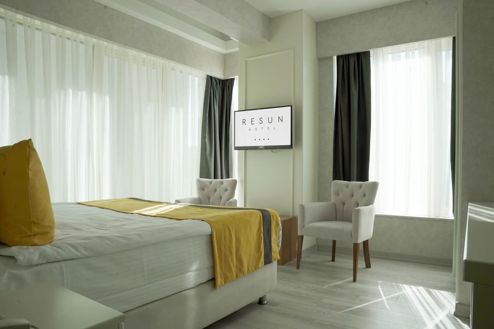 Deluxe Double Room | Premium bedding, free minibar items, in-room safe, laptop workspace