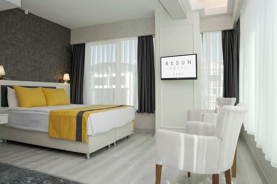 Deluxe Double Room | Premium bedding, free minibar items, in-room safe, laptop workspace