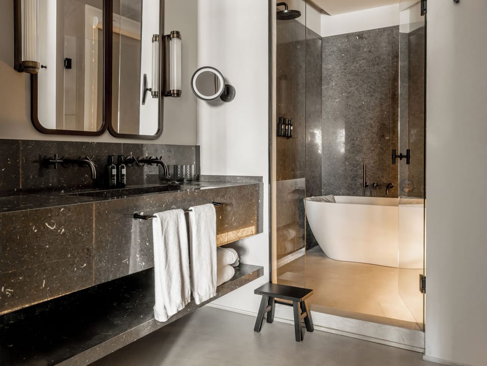 Grand Suite | Bathroom | Deep soaking tub, hair dryer, bathrobes, slippers