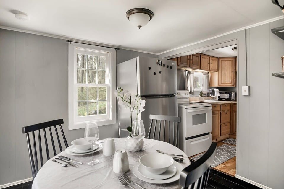 Our bright dining area is the perfect setting for your meal or fun game night