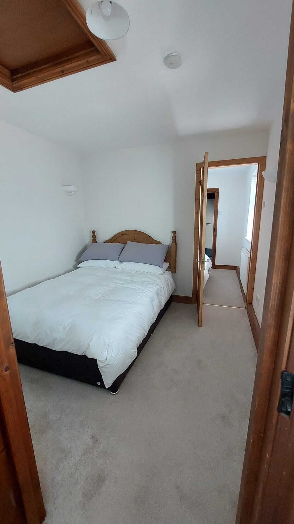 The 2 bedrooms from Lounge into bedroom1 through bedroom2 and bathroom at thend