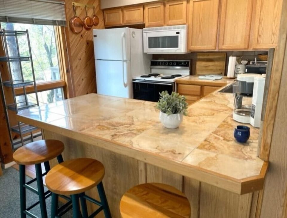 Eat in Kitchen that opens to the outdoor deck.